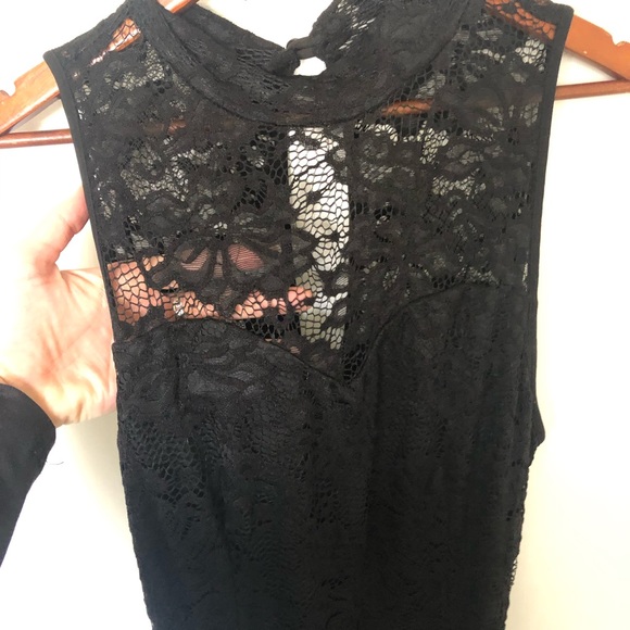 Black romper, Eclipse size M, fits size 8-10. Hand wash, 100% polyester - Picture 11 of 11